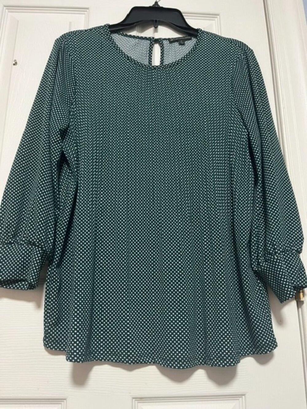 Woman's Green Polka dotted Pleated Blouse